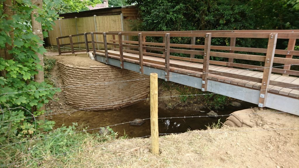 Concrete bagwork abutments to a new footbridge